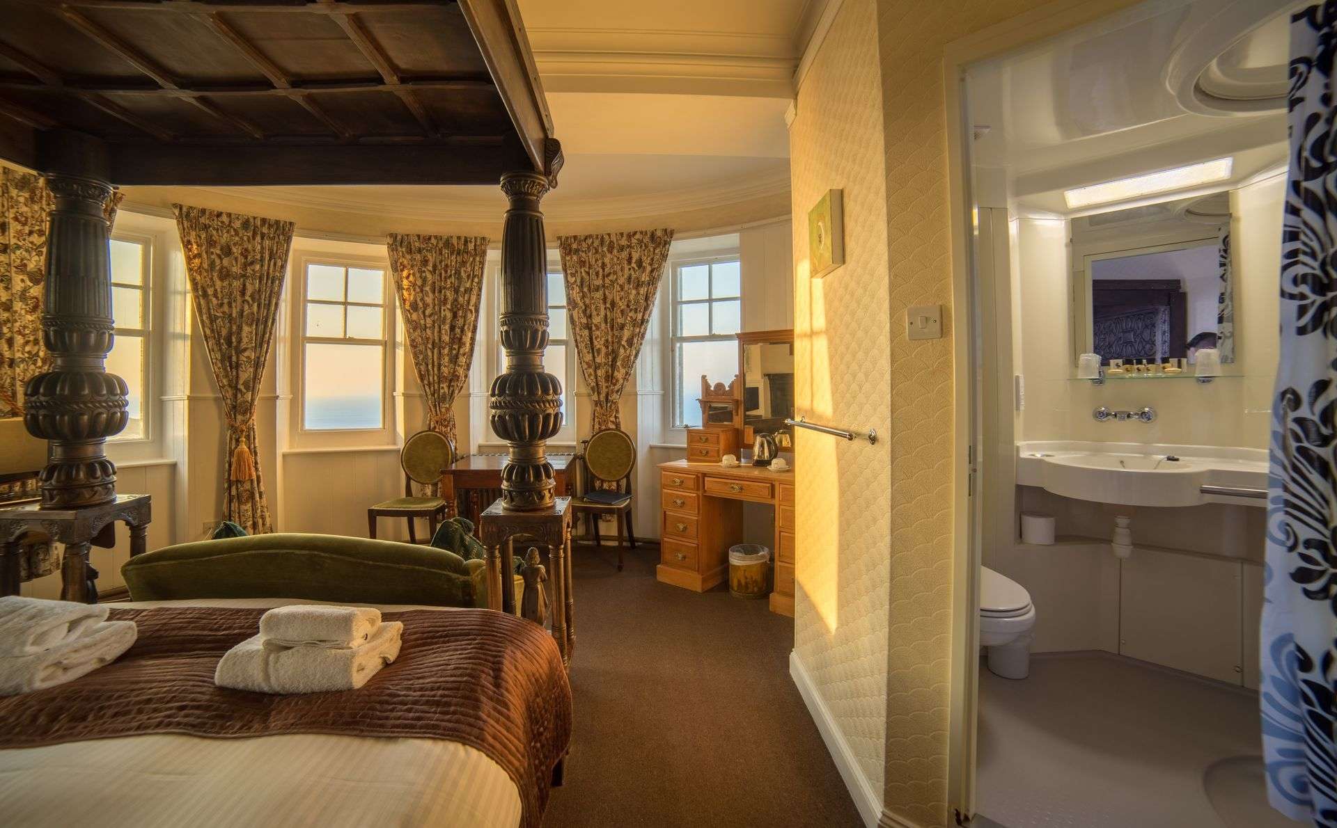 Classic Four Poster Room interior with sea views