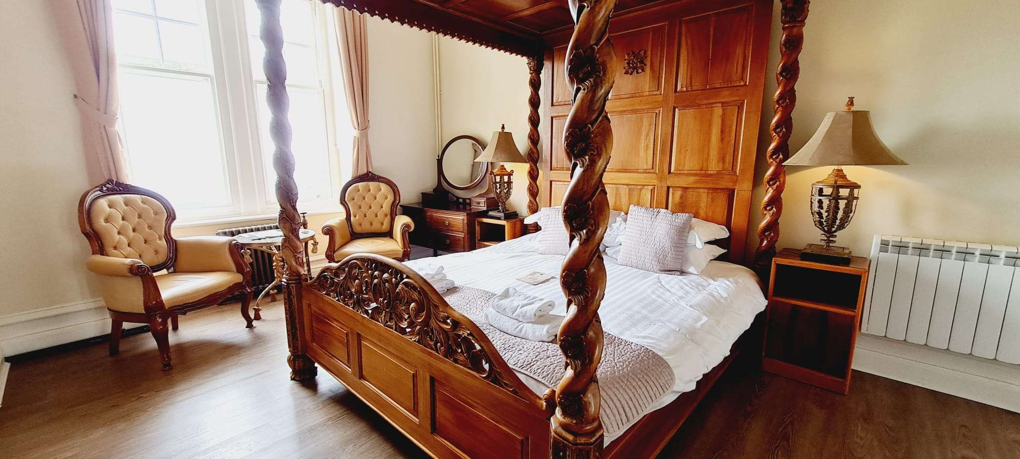 Classic Four Poster bedroom image Camelot Castle Hotel Tintagel