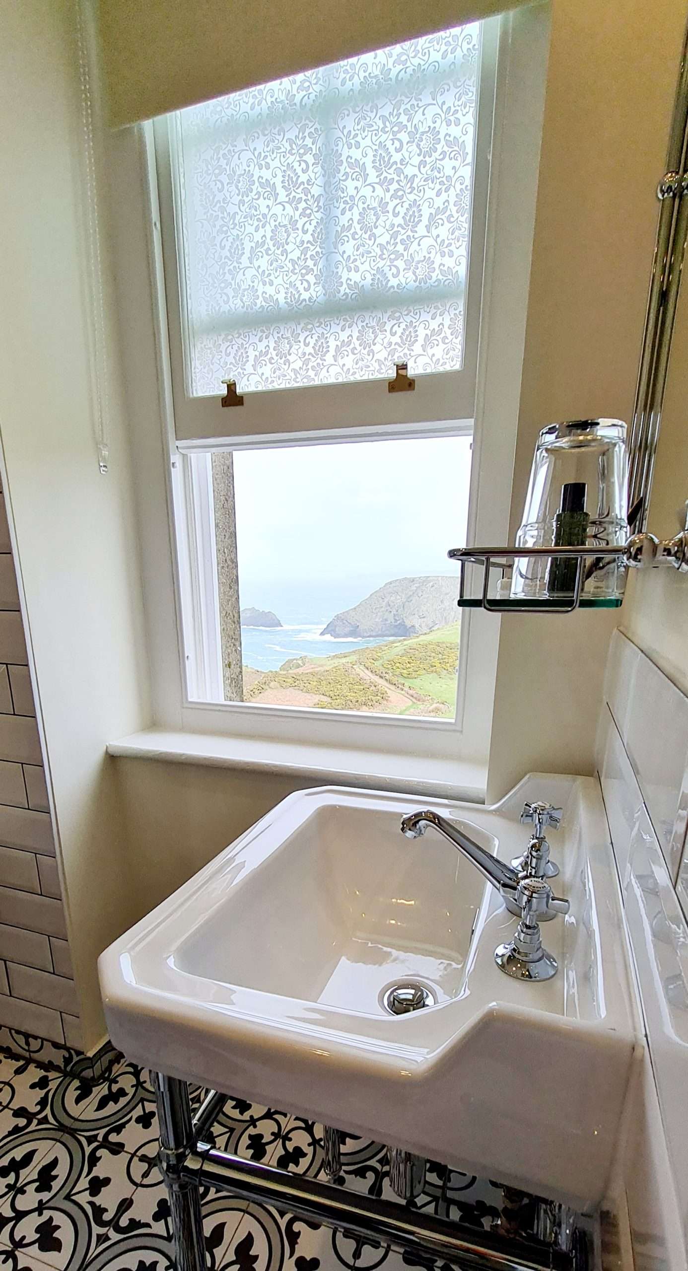 Bathroom sink with coastal views from the North Tower Suite