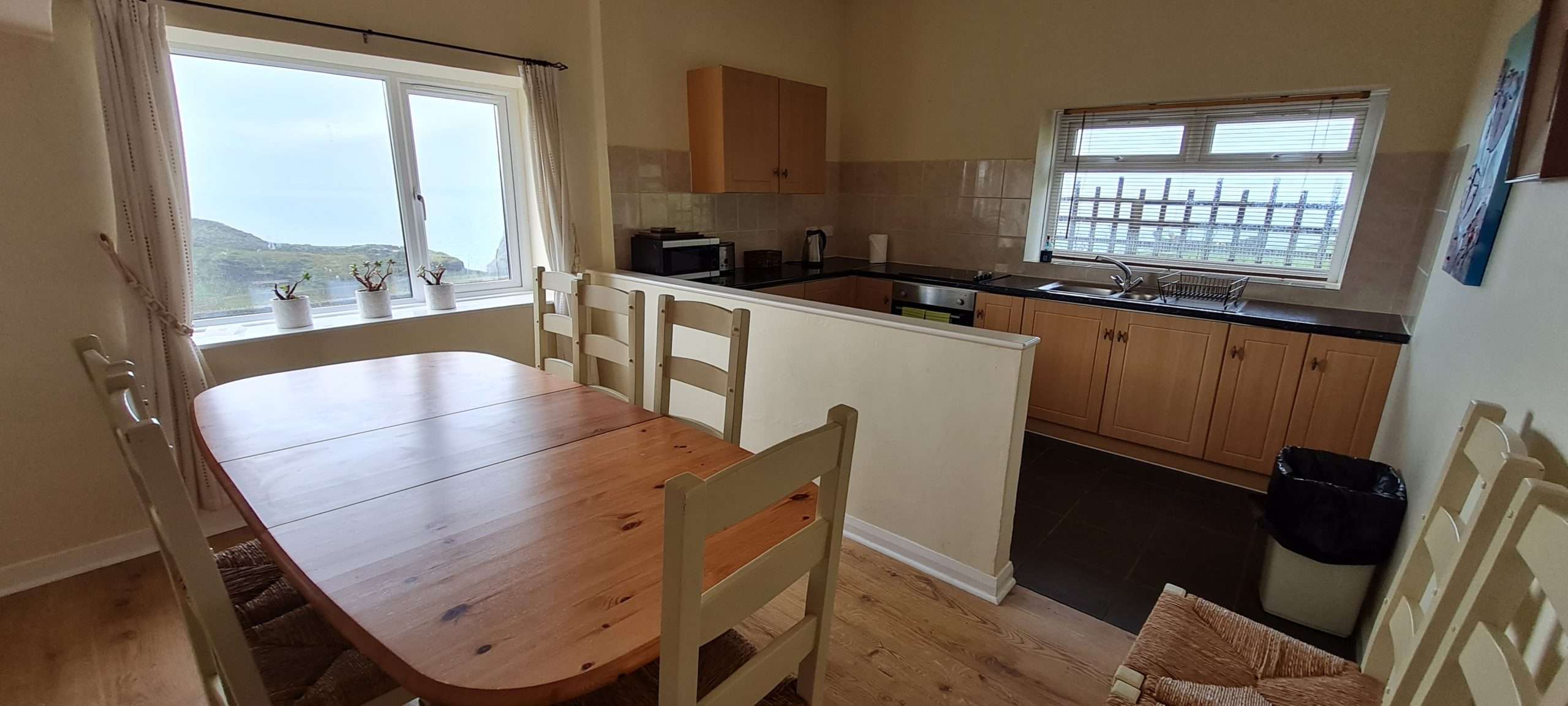 Kitchen and dining area in Classic Self Catering Apartment No. 3
