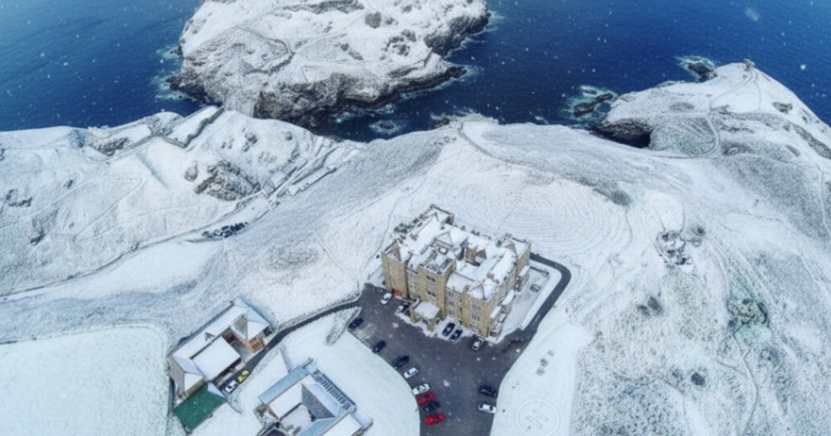 Aerial image of Camelot Castle in the snow